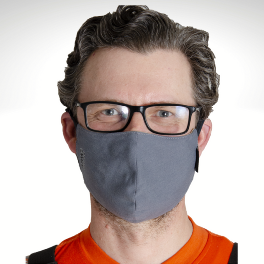 MWG COMFORT WEAVE FR Face Mask. FR Face Mask is light grey with black ear loops. FR Face Mask has an MWG logo on right cheek. FR Face Mask is amde with MWG COMFORT WEAVE, an inherently flame-resistant lightweight fabric.