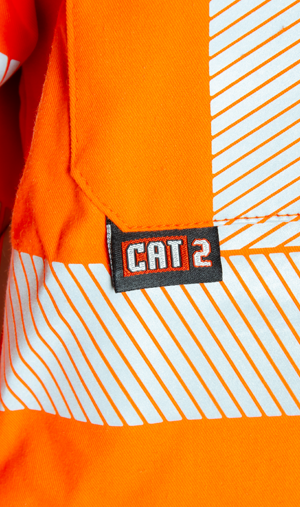 CAT 2 rating displayed on MWG COMFORT WEAVE FR button-down shirt. Identifies flame-resistant (FR) properties. MWG COMFORT WEAVE is an inherent FR fabric.