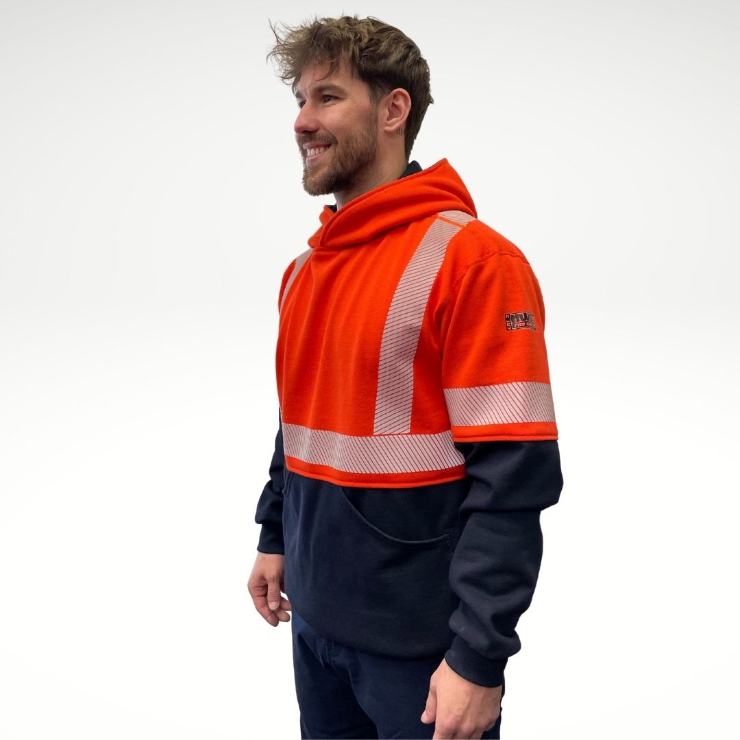 MWG BLOCKER FR Men's Hoodie. Men's fire-resistant hoodie is bright orange and navy with hi-vis striping. Fire-resistant hoodie is inherently flame-resistant, made from a heavyweight FR fleece. FR Hoodie is CAT 3 FR.