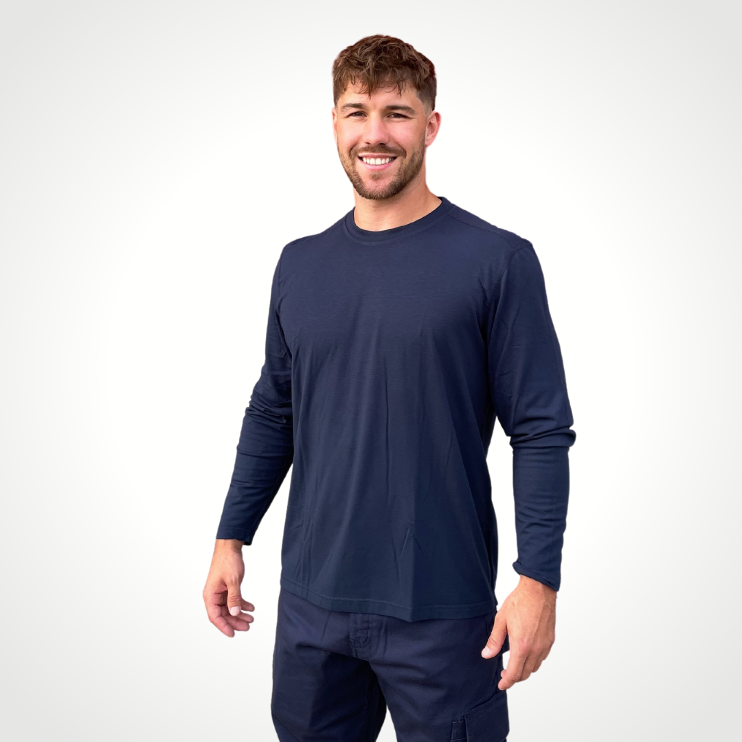 MWG FLEXSAFE Men's FR Long-Sleeve T-Shirt. Men's FR Base Layer Shirt is navy. Men's FR Base Layer Long-Sleeve is made with MWG FLEXSAFE, an inherent flame-resistant fabric. MWG FLEXSAFE is a moisture-wicking, 4-way stretch fabric. FR Base Layer shirt has CAT 1 FR rating.