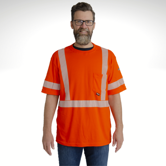 Image of MWG FR T-Shirt. Flame-resistant (FR) short sleeve t-shirt. FR shirt is bright orange in colour with silver segmented reflective tape on torso and sleeves to meet high-visibility standard CSA Z96-15. Large chest pocket and CAT 2 label are seen on front of shirt. MWG FR T-Shirt is made from a lightweight inherent flame-resistant (FR) fabric.