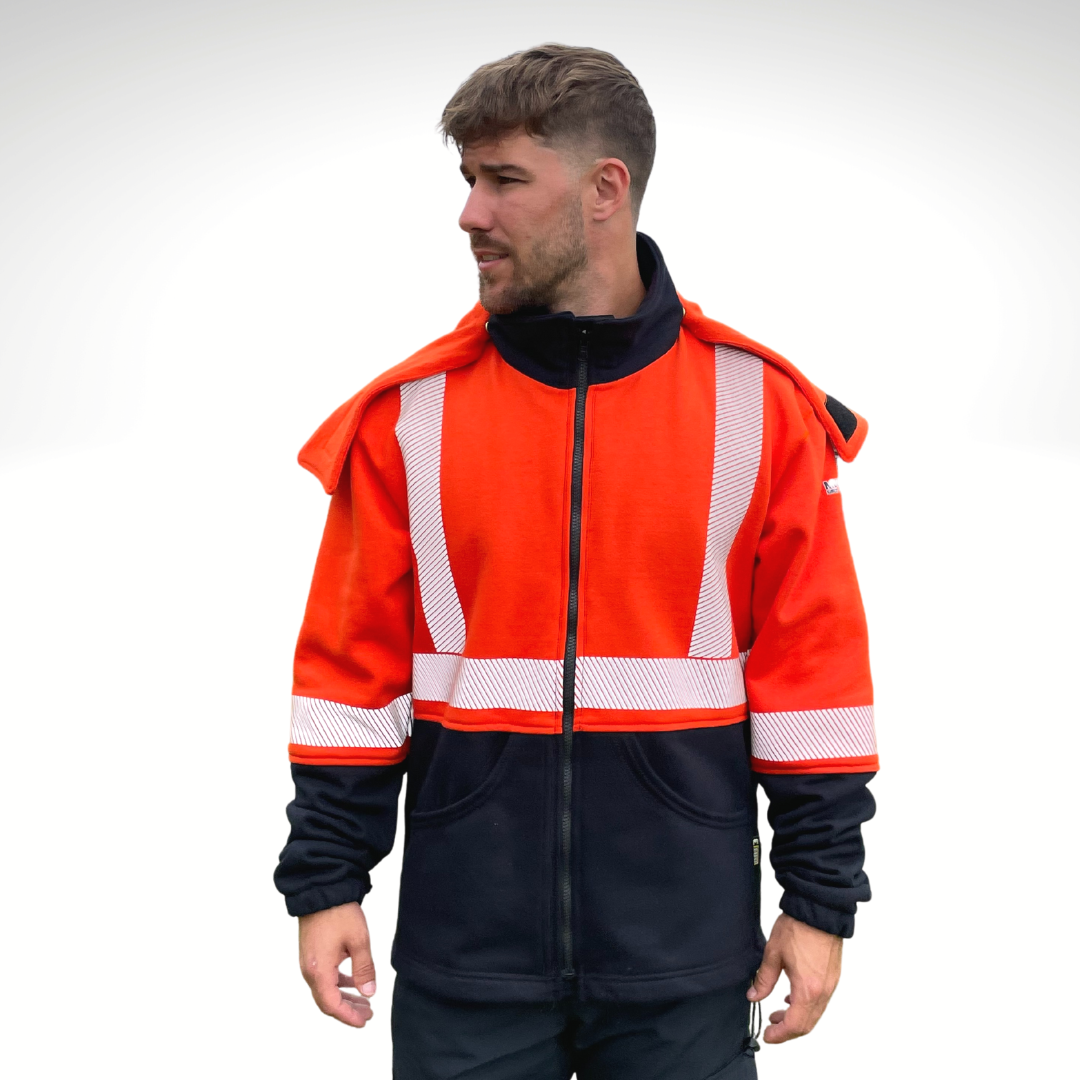 MWG BLOCKER Men's FR Hoodie. Men's FR Hoodie is bright orange and navy. Men's FR Hoodie has silver reflective striping for high-visibility. FR Hoodie has a black FR zipper and a detachable hood for safety. FR Hoodie is made with MWG BLOCKER, an inherently flame-resistant heavyweight fleece. FR Hoodie has a CAT 3 FR rating. FR Hoodie is made in Canada.