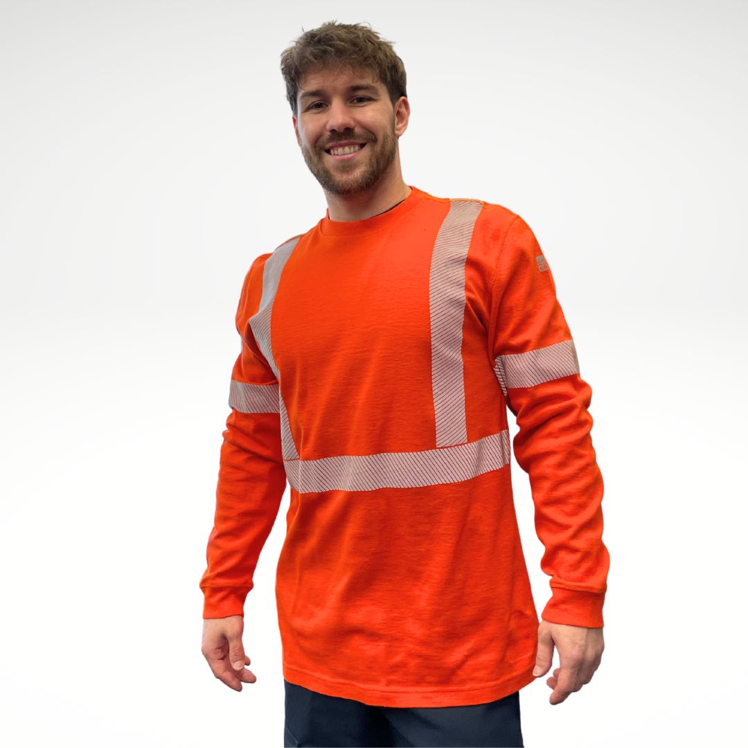MWG COTTON COMFORT Men's FR Long-Sleeve Shirt. FR Shirt is bright orange with silver segmented reflective striping on torso and sleeves. Fire-resistant shirt is made with fire-resistant cotton. FR Shirt has a CAT 2 FR rating.