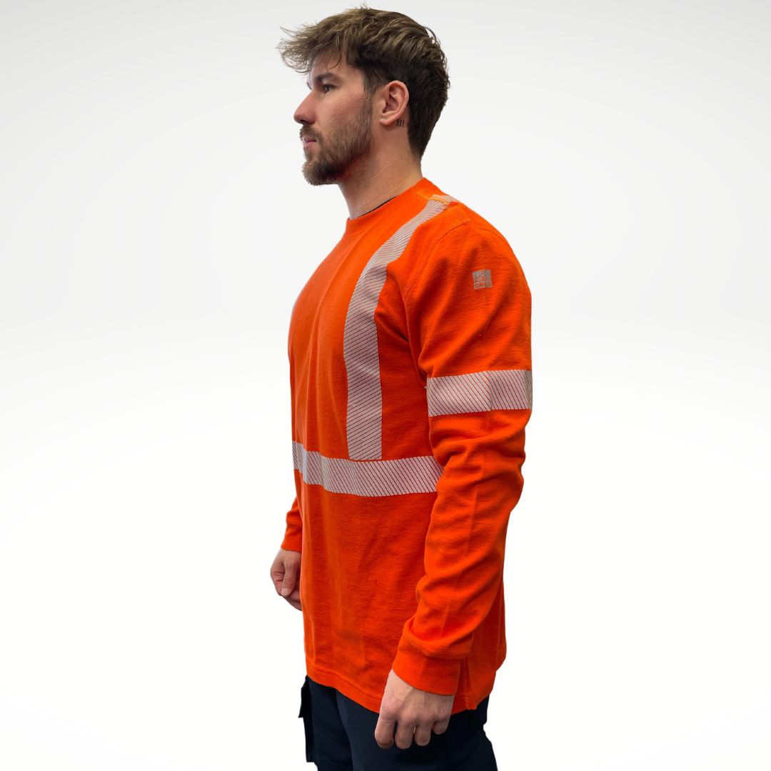 MWG COTTON COMFORT Men's FR Long-Sleeve Shirt. FR Shirt is bright orange with silver segmented reflective striping on torso and sleeves. Fire-resistant shirt is made with fire-resistant cotton. FR Shirt has a CAT 2 FR rating.