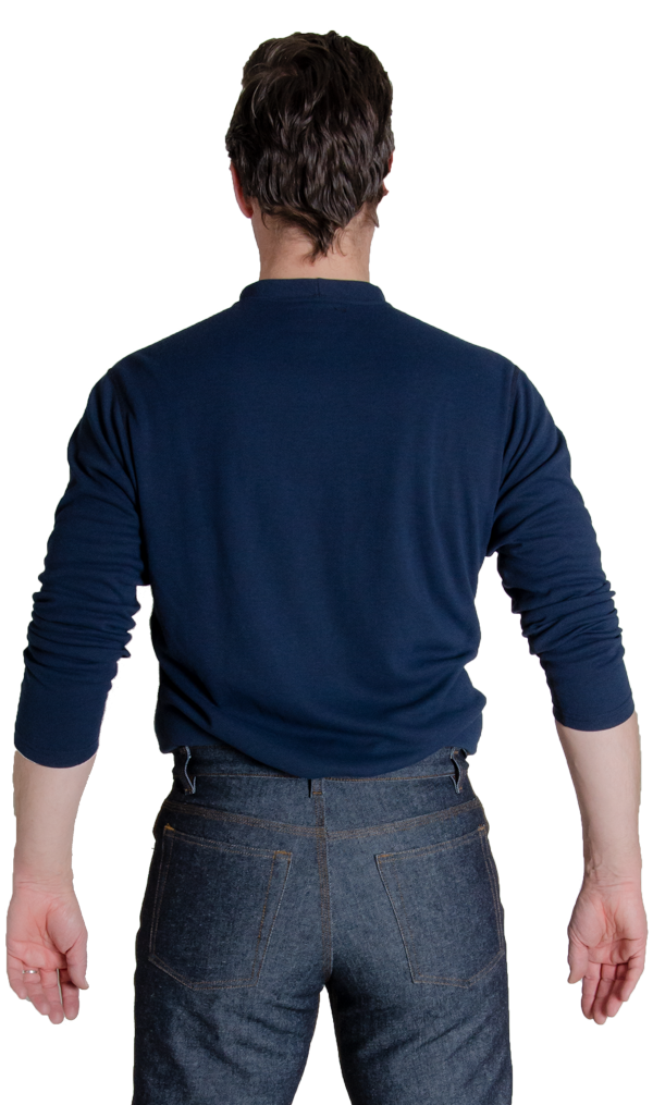 Back view of MWG TRANSMISSION long-sleeve t-shirt. MWG TRANSMISSION FR long-sleeve t-shirt is navy in colour and made with a lightweight flame-resistant (FR) fabric. Model is wearing MWG TRANSMISSION shirt tucked in to MWG FR blue jeans.