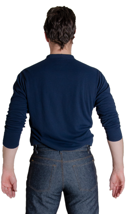 Back view of MWG TRANSMISSION long-sleeve t-shirt. MWG TRANSMISSION FR long-sleeve t-shirt is navy in colour and made with a lightweight flame-resistant (FR) fabric. Model is wearing MWG TRANSMISSION shirt tucked in to MWG FR blue jeans.