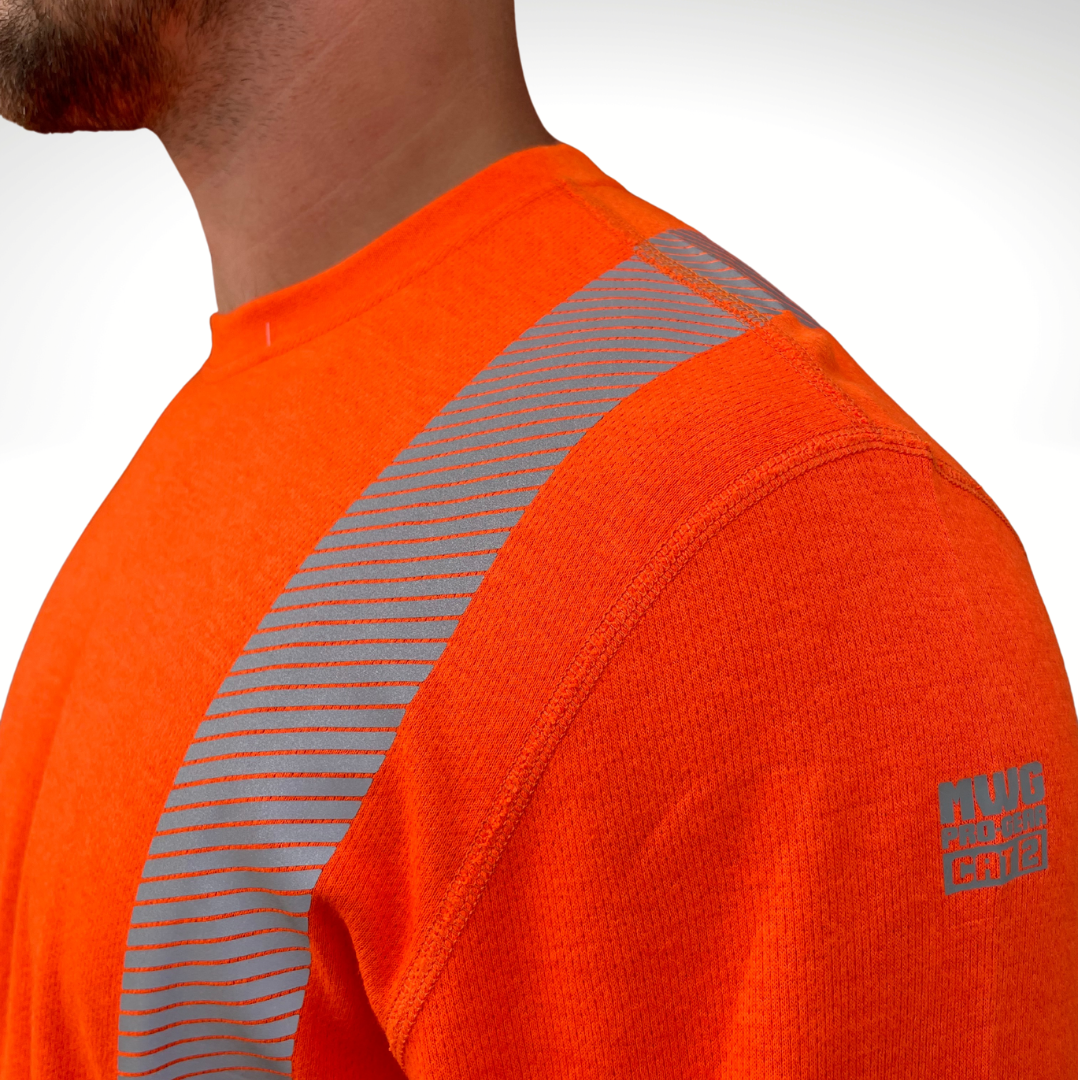 Image of MWG TRANSMISSION FR long-sleeve t-shirt in bright orange. MWG TRANSMISSION FR long-sleeve shirt is made with inherent FR fabric that is bright orange in colour with silver segmented reflective tape to meet CSA Z96-15 high-visibility standard. MWG TRANSMISSION is designed for workers in electrical utilities and mining