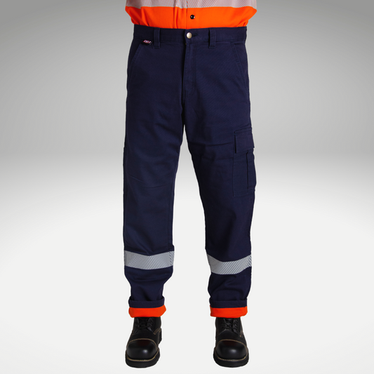 Image of MWG FLEXGUARD FR//AR Lined Stretch Canvas Utility Pant. Lined FR Stretch Pant is navy in colour with silver segmented reflective tape for high-visibility. Navy FR Pant has orange lining for warmth in the winter. MWG FLEXGUARD is a flame-resistant canvas.