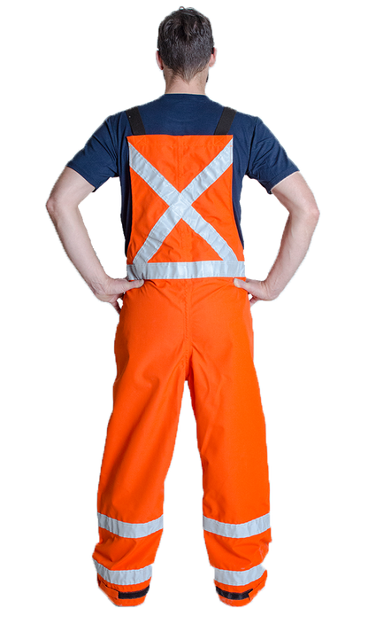 Back view of MWG FR rain resistant overall with higher back. The back sits just below shoulder blades. FR Rain Overall is bright orange in colour with silver reflective tape in an X on the back and wrapped around legs below knees. FR Rain Overall is made with an inherent flame-resistant (FR) fabric.