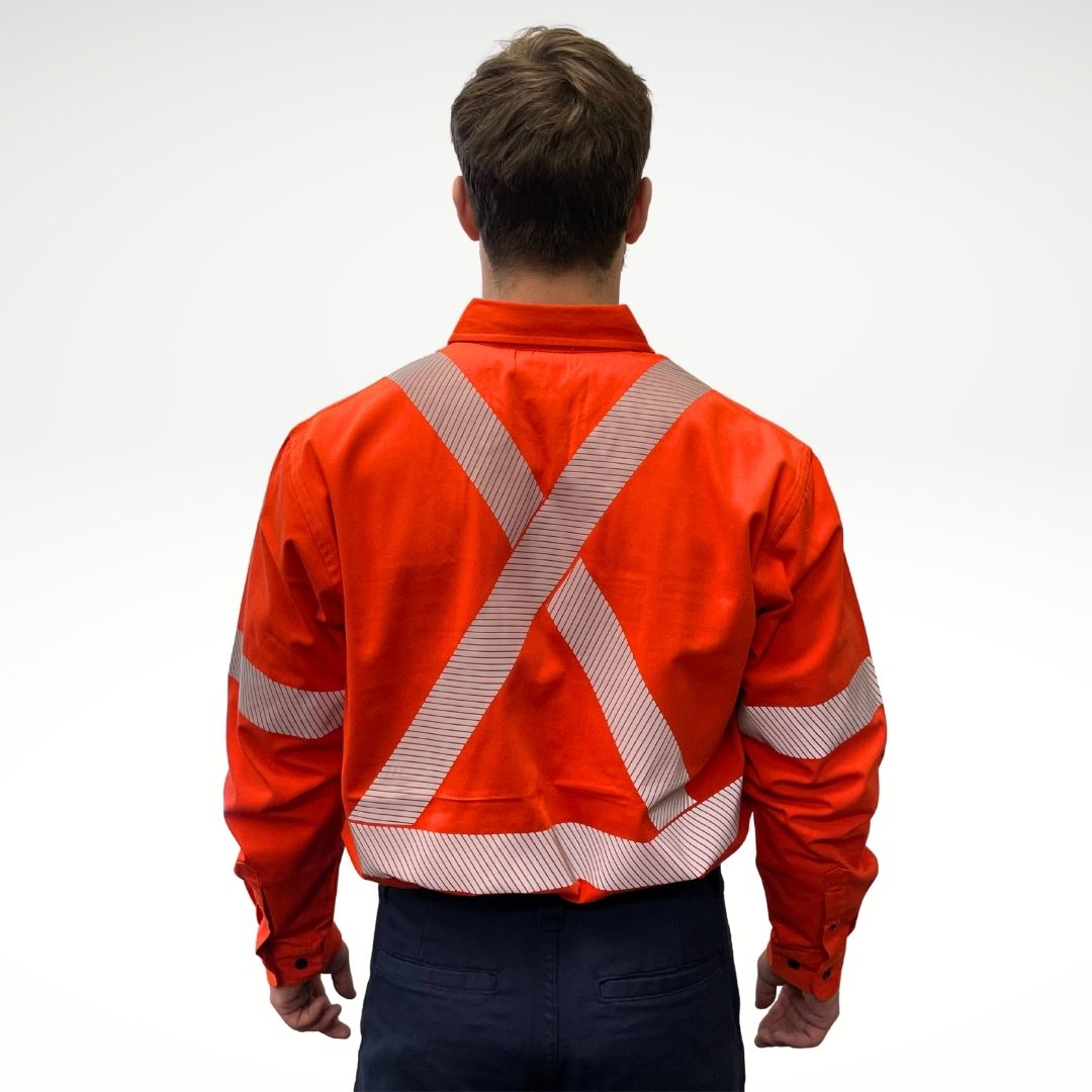 MWG COMFORT WEAVE Men's FR Shirt. Men's fire-resistant shirt is bright orange with black buttons and hi-vis reflective striping. Men's FR Shirt has two chest pockets and a dress shirt collar. Fire-resistant shirt is made with inherently fire-resistant fabric. FR Shirt is CAT 2 FR.