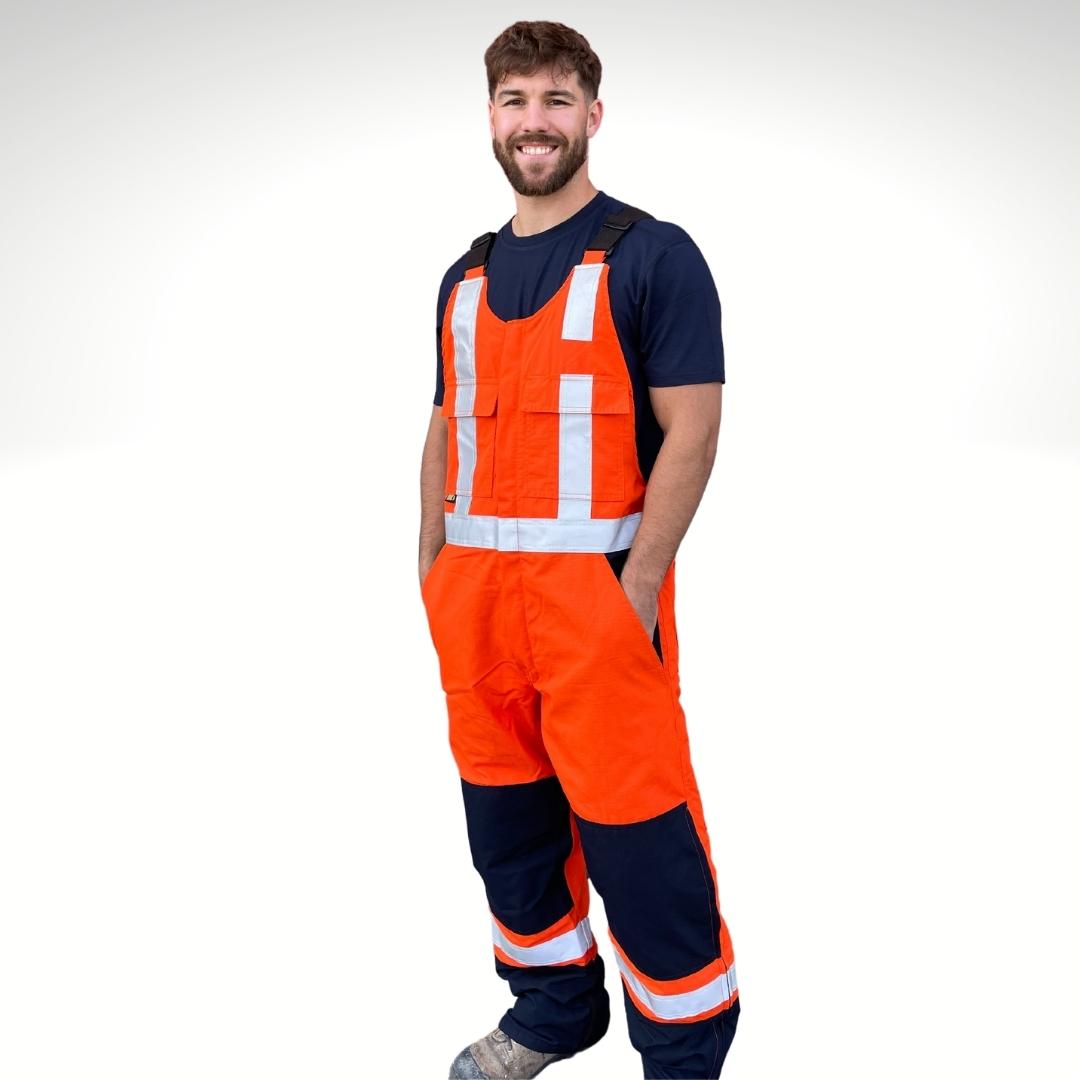 MWG RIPGUARD Men's FR Knit-Lined Overall. Men's FR Overalls are bright orange and navy with silver reflective striping on torso and legs for high-visibility. Men's FR Overall has two large pockets on chest with flaps. Men's FR Bib Overall has navy knees and pockets. FR Overalls have a knit-lining for warmth in cold weather. FR Overalls are made with a flame-resistant ripstop fabric.