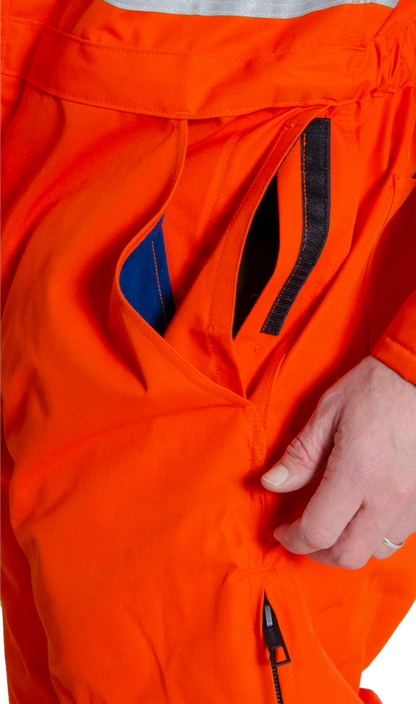 Image of double pocket found in MWG FRC coverall. Includes velcro closure to keep items secure. MWG Coverall is made with inherent flame-resistant (FR) fabric.