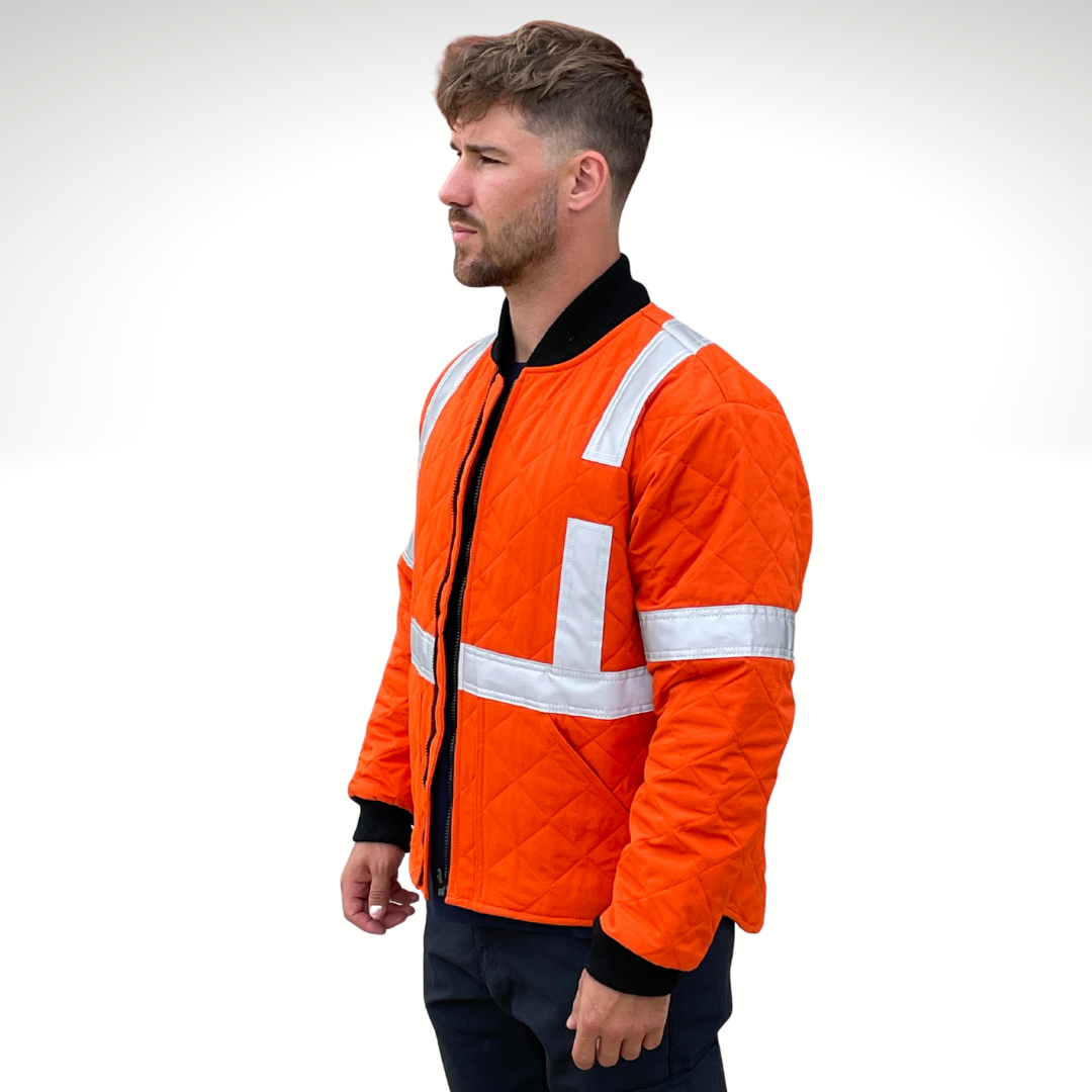 MWG RIPGUARD Men's FR Freezer Jacket. FR Freezer Jacket is bright orange. FR Freezer Jacket has silver reflective striping on torso and sleeves for high-visibility. FR Freezer Jacket has a black FR zipper and black FR cuffs. FR Freezer Jacket is quilted with a 3" diamond quilt. FR Freezer Jacket is made with MWG RIPGUARD, an inherently flame-resistant ripstop fabric. FR Freezer Jacket has a CAT 4 FR rating.