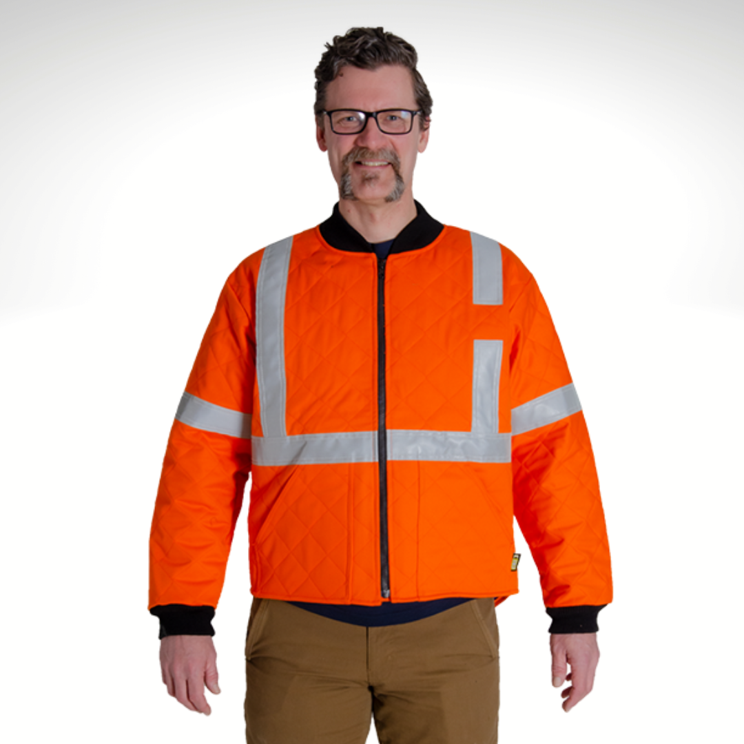 Image of MWG COTTON COMFORT FR/AR freezer jacket. MWG FR Freezer Jacket is bright orange with silver reflective tape on arms and torso. Freezer Jacket is made with MWG COTTON COMFORT, a flame-resistant FR cotton.