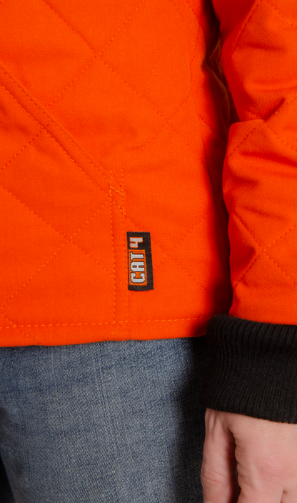 Close up image of CAT 4 label on women's FR freezer jacket identifying flame-resistance.