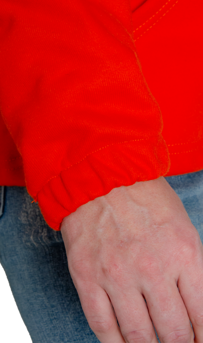 Image of MWG BLOCKER FRC fleece hoodie sleeve cuff. Bright orange in colour. Fleece is an inherent flame-resistant (FR) fabric.
