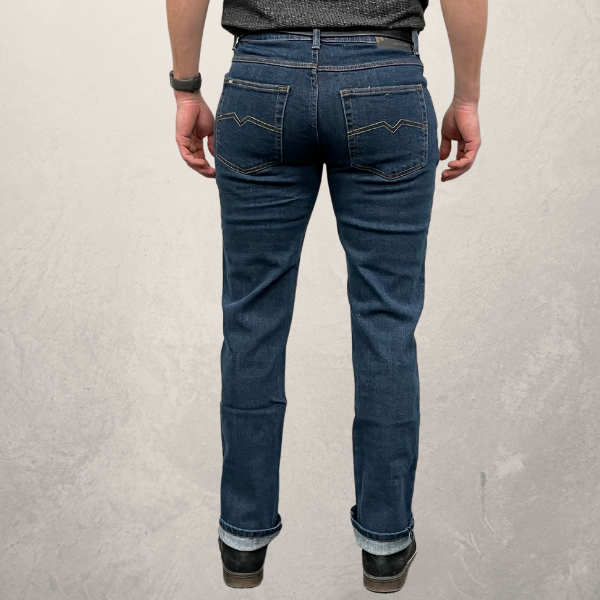 Back view of MWG Men's Premium Straight Leg Jeans. Straight Leg Jeans are navy in colour with gold stitching and two large back pockets. Model is wearing jeans with cuffs rolled.