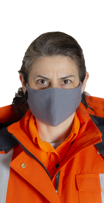 Image of woman wearing MWG Gray Cup FRC face mask. FR Face mask is grey in colour and made from MWG COMFORT WEAVE, an inherent flame-resistant FR fabric.