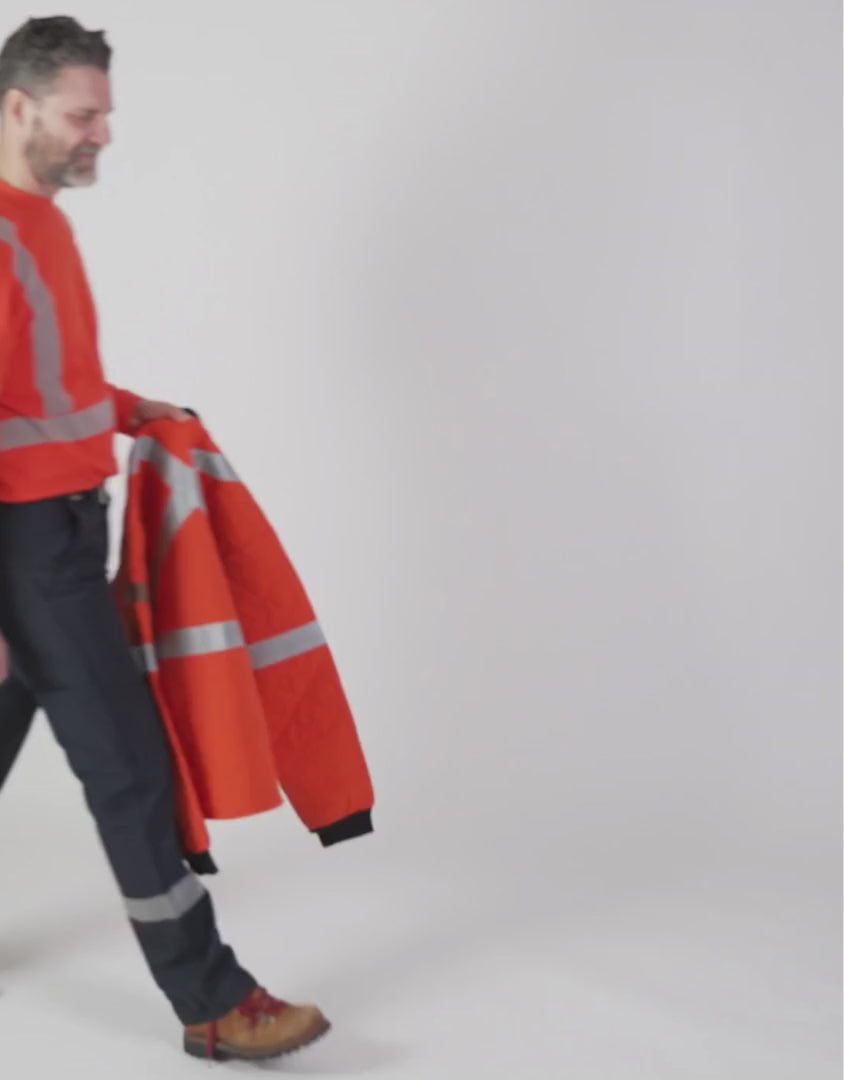 Men's FR Freezer Jacket. Men's FR Jacket is bright orange with silver reflective striping on torso and sleeves for high-visibility. Men's FR Jacket has black knit cuffs and collar. FR Freezer Jacket has a diamond quilt. FR Jacket has a CAT 4 FR rating.